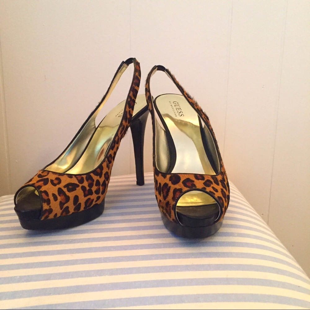 Cheetah print 5.5” high heel Guess open toe shoe.